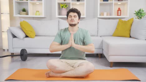 Man-meditating-at-home.